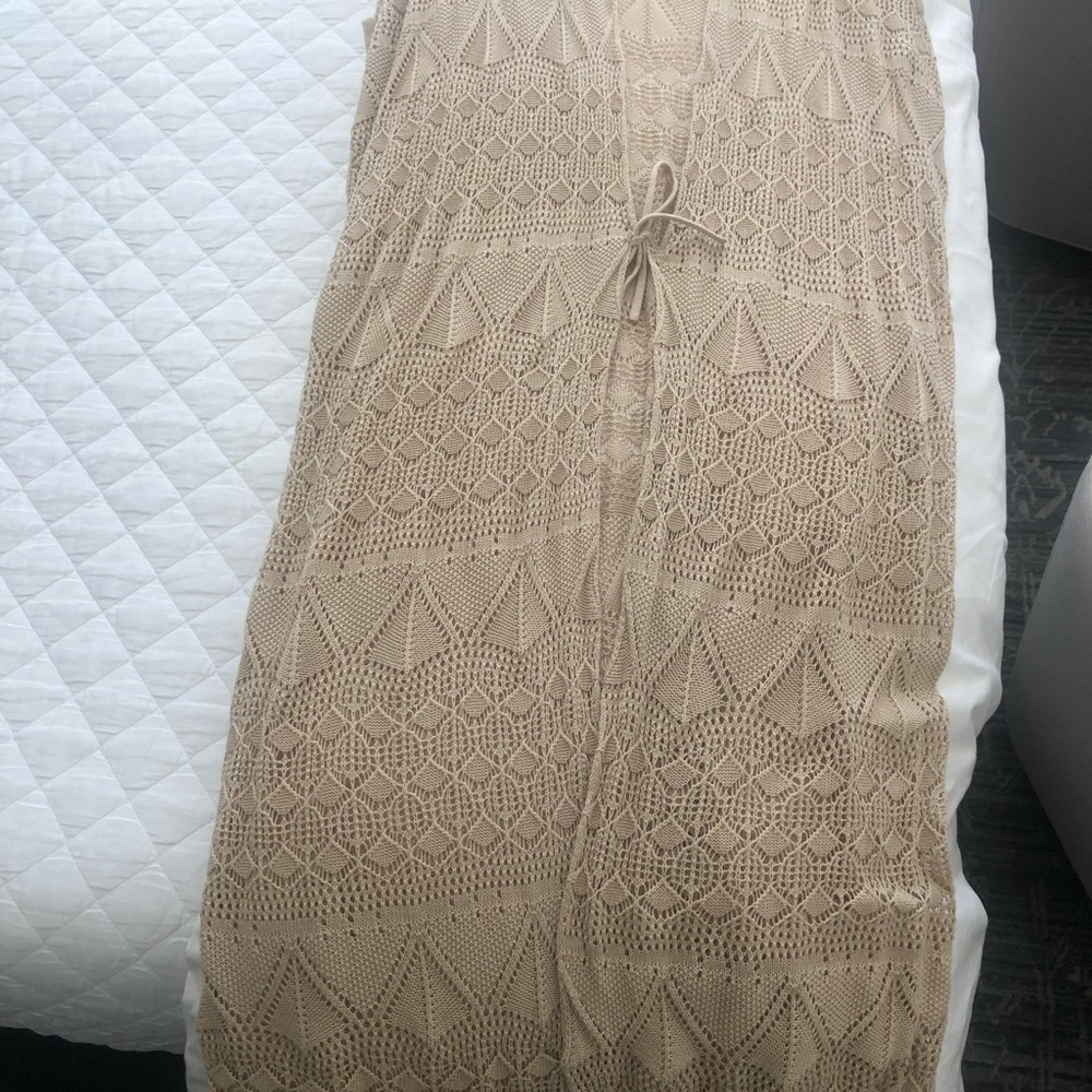 Cap sleeve khaki in color sweater poncho calf length. Excellent condition.